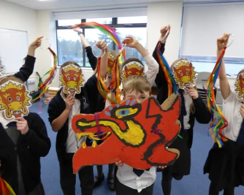 A group of children enjoying a teaching session with Encore Arts